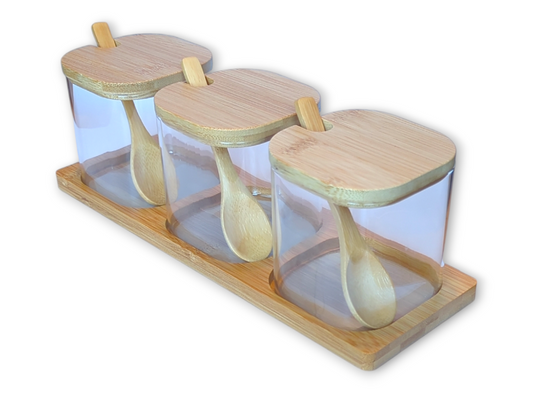 Trio Of Glass Jars On Bamboo Tray