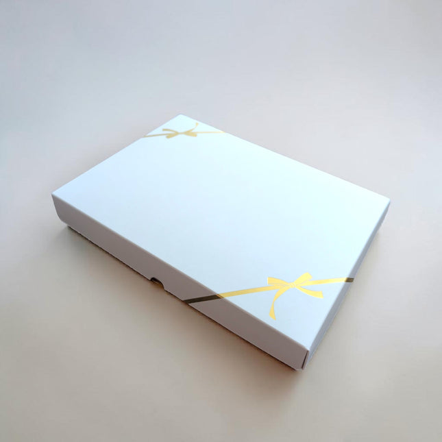 White Gift Box With Gold Bow Detail